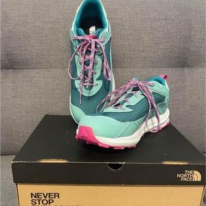 Green/Turquoise athletic women’s shoes with pink accents. Only wore once. Size 7